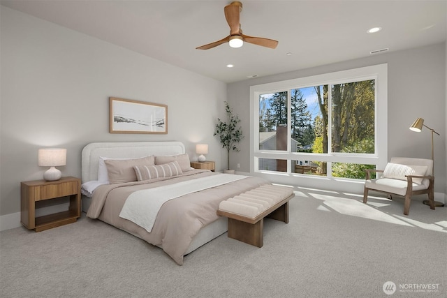 carpeted bedroom with recessed lighting, visible vents, and a ceiling fan