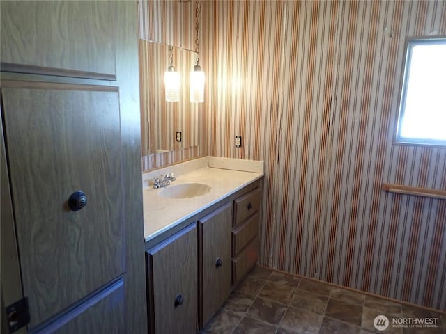 10515 60th Street Ct E Unit 165, Puyallup, WA 98372 - bathroom featuring vanity and wallpapered walls