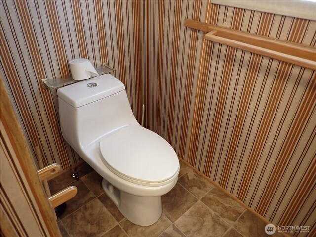 10515 60th Street Ct E Unit 165, Puyallup, WA 98372 - bathroom with tile patterned floors, wallpapered walls, and toilet