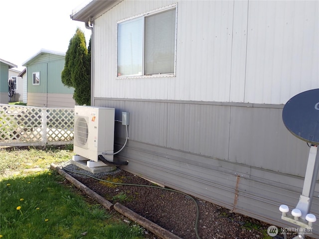 10515 60th Street Ct E Unit 165, Puyallup, WA 98372 - view of property exterior featuring fence and ac unit