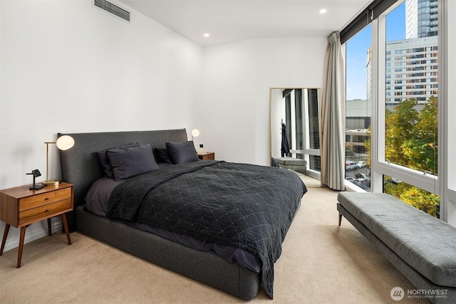 bedroom featuring recessed lighting, visible vents, and light colored carpet