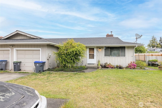 9941 Old Olympic Hwy, Sequim, WA 98382 - ranch-style home with a chimney, an attached garage, roof with shingles, and asphalt driveway