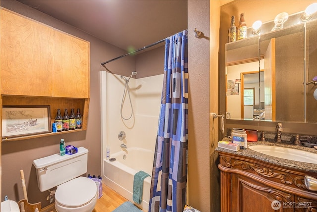 9941 Old Olympic Hwy, Sequim, WA 98382 - bathroom with toilet, shower / bathtub combination with curtain, vanity, and wood finished floors