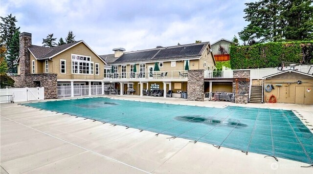 2212 186th Ave NE, Redmond, WA 98052 - pool with fence and a patio