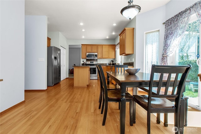 2825 Haig Dr SE, Olympia, WA 98501 - dining space featuring recessed lighting, light wood finished floors, baseboards, and a healthy amount of sunlight