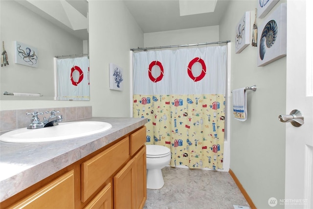 2825 Haig Dr SE, Olympia, WA 98501 - full bath with shower / bath combo, tasteful backsplash, toilet, vanity, and a skylight