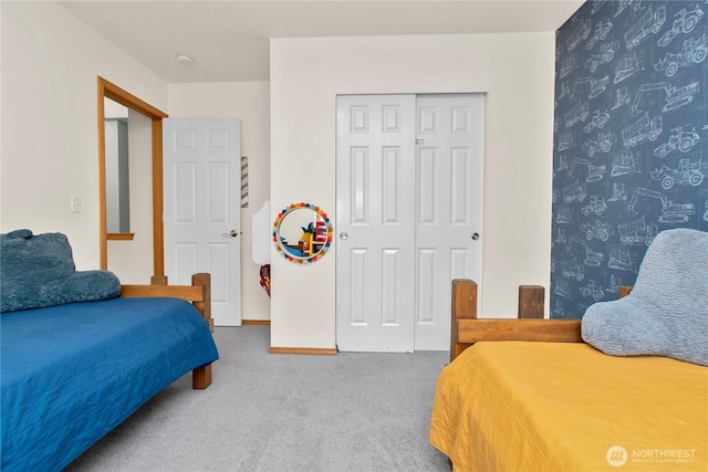 2825 Haig Dr SE, Olympia, WA 98501 - bedroom featuring a closet, baseboards, and carpet flooring