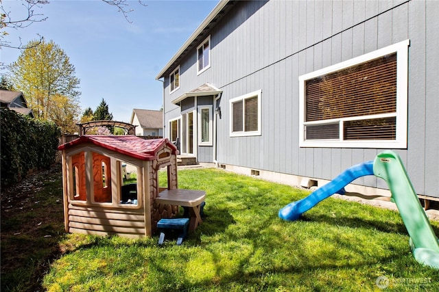 2825 Haig Dr SE, Olympia, WA 98501 - rear view of property with crawl space and a lawn