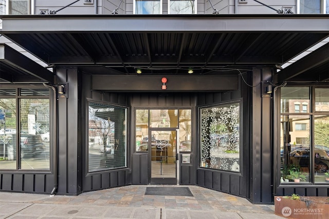 711 N 35th St, Seattle, WA 98103 - property entrance featuring board and batten siding