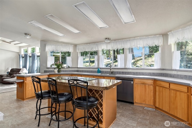 4592 Evenstar Ln, Freeland, WA 98249 - bar featuring dishwasher, a sink, healthy amount of natural light, and black electric cooktop