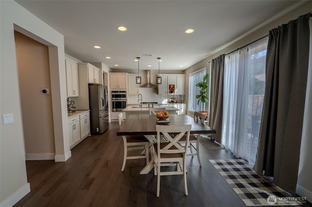 29027 NE 156th St, Duvall, WA 98019 - dining area with baseboards, dark wood-style floors, and recessed lighting