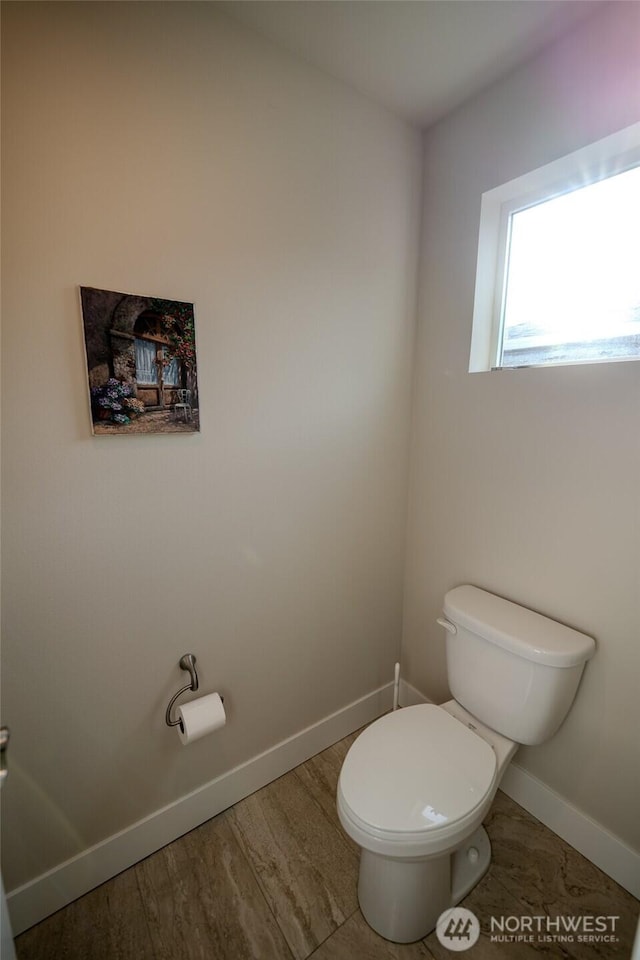 29027 NE 156th St, Duvall, WA 98019 - bathroom featuring baseboards, toilet, and wood finished floors