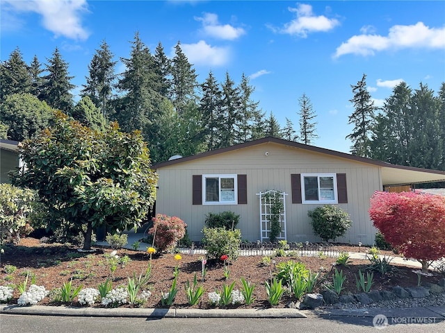 view of front of home with an attached carport