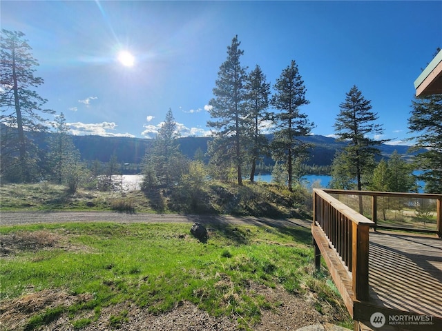 view of mountain feature featuring a water view