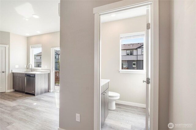 1848 Eastgate Loop, Ferndale, WA 98248 - bathroom with vanity, baseboards, wood finished floors, and toilet
