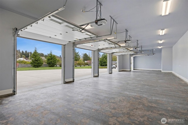 581 Marine Dr, Point Roberts, WA 98281 - garage with baseboards and a garage door opener