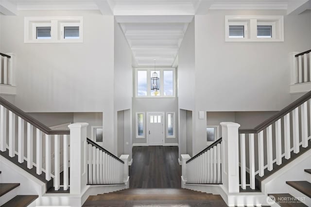 581 Marine Dr, Point Roberts, WA 98281 - foyer entrance featuring wood finished floors, a towering ceiling, stairway, and crown molding