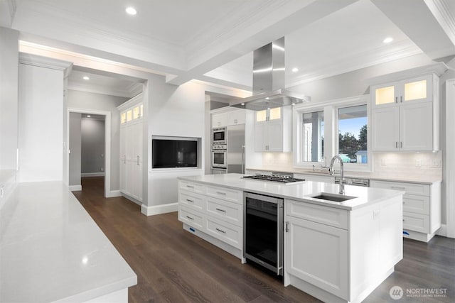 581 Marine Dr, Point Roberts, WA 98281 - kitchen featuring island range hood, tasteful backsplash, beverage cooler, and a sink