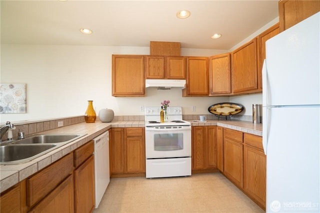 1304 H Ave, Anacortes, WA 98221 - kitchen featuring a sink, recessed lighting, white appliances, brown cabinetry, and under cabinet range hood