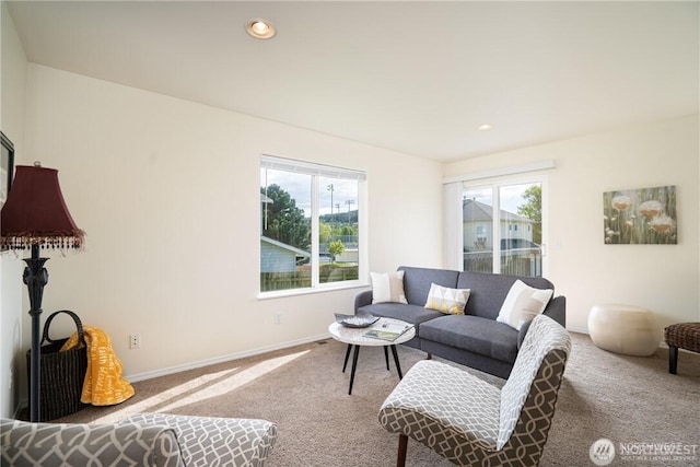 1304 H Ave, Anacortes, WA 98221 - living area with recessed lighting, baseboards, carpet flooring, and plenty of natural light