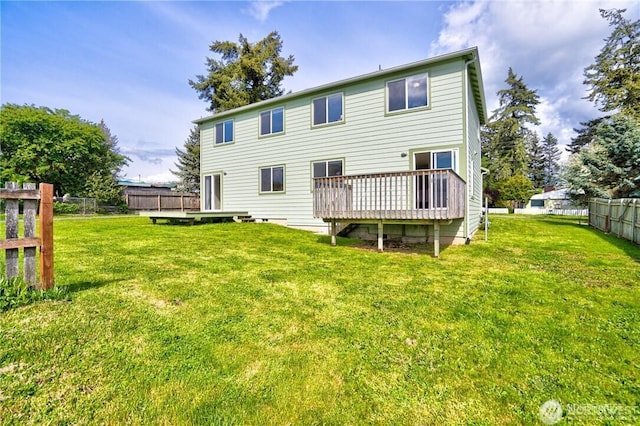 1304 H Ave, Anacortes, WA 98221 - rear view of property featuring a yard, fence, and a deck