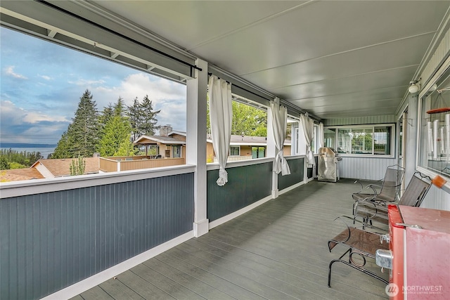 sunroom featuring a healthy amount of sunlight