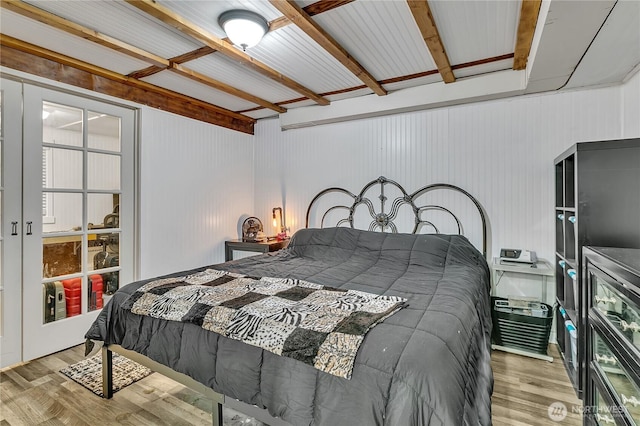 bedroom with wood finished floors