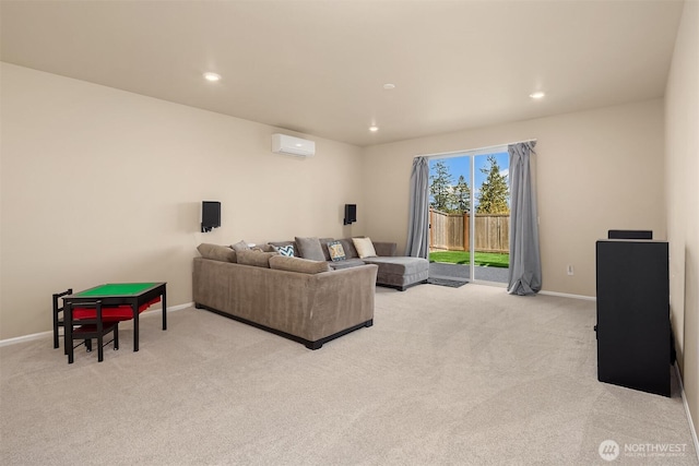living area with a wall mounted AC, baseboards, and light carpet