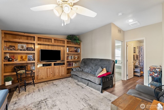 11325 126th St E Unit 229, Puyallup, WA 98374 - living room with light wood-type flooring, visible vents, and ceiling fan