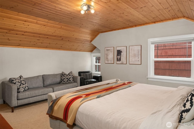 bedroom with wooden ceiling, carpet, and lofted ceiling