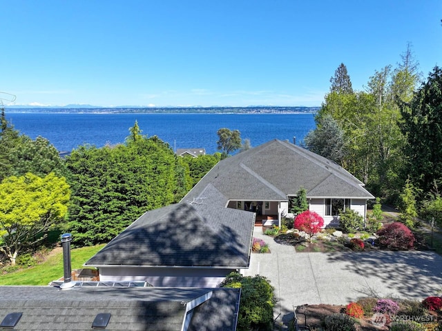 drone / aerial view with a water view