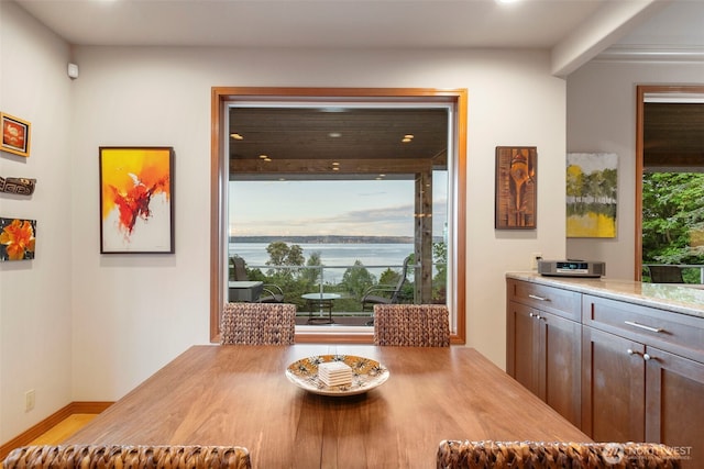 dining area featuring recessed lighting