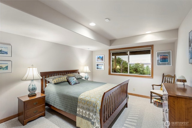 bedroom with light colored carpet, baseboards, and recessed lighting