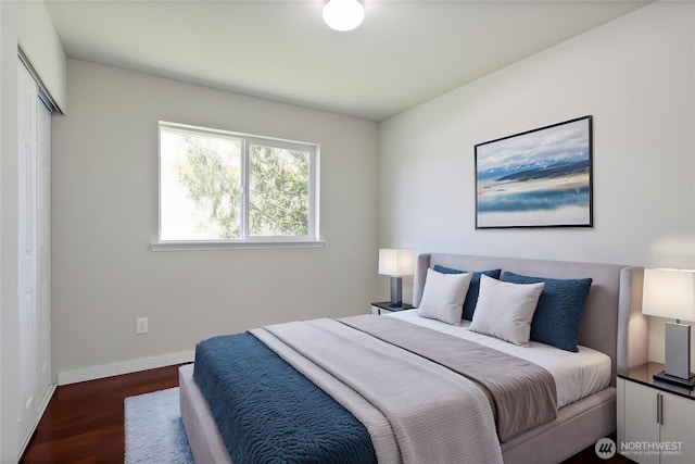 2322 157th Street Ct E, Tacoma, WA 98445 - bedroom featuring baseboards, wood finished floors, and a closet