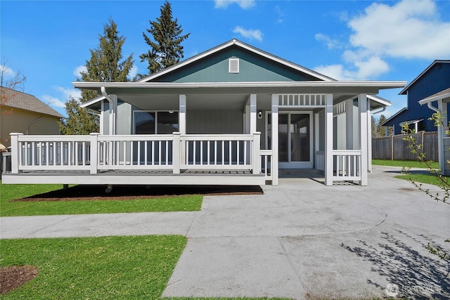 2322 157th Street Ct E, Tacoma, WA 98445 - view of front of house with fence and a porch