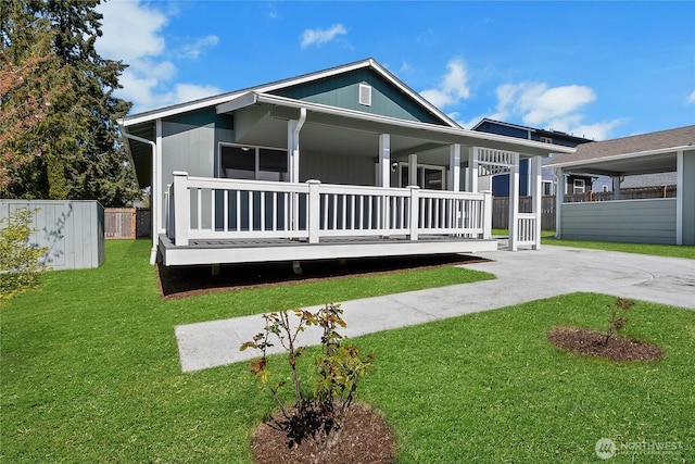 2322 157th Street Ct E, Tacoma, WA 98445 - view of front of property featuring fence, a front lawn, and covered porch