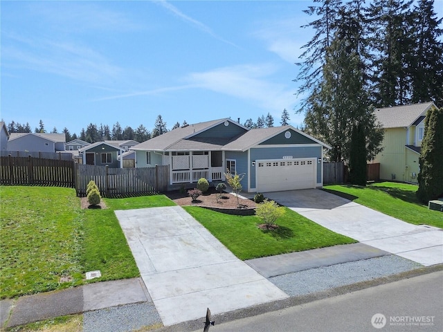 2322 157th Street Ct E, Tacoma, WA 98445 - view of front of house with a garage, driveway, a front lawn, and fence