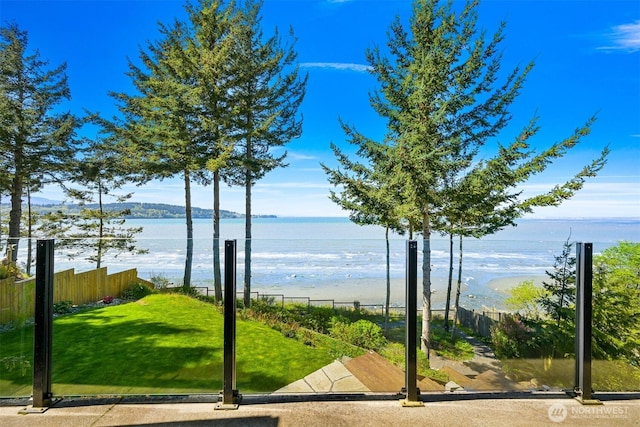 view of water feature with fence