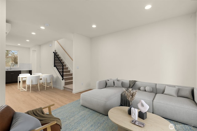 9221C 14th Ave NW, Seattle, WA 98117 - living room featuring recessed lighting, light wood-style flooring, and stairs