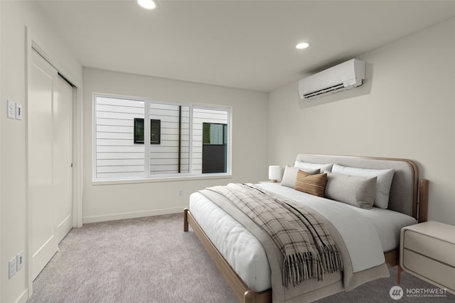 9221C 14th Ave NW, Seattle, WA 98117 - carpeted bedroom featuring an AC wall unit, baseboards, recessed lighting, and a closet