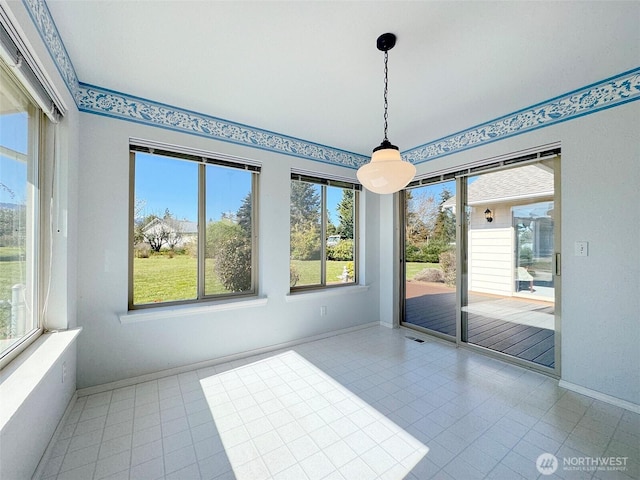462 E Runnion, Sequim, WA 98382 - unfurnished dining area featuring visible vents, tile patterned floors, and baseboards