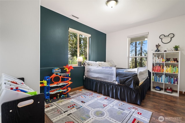 27406 NE 65th St, Camas, WA 98607 - bedroom featuring multiple windows and wood finished floors