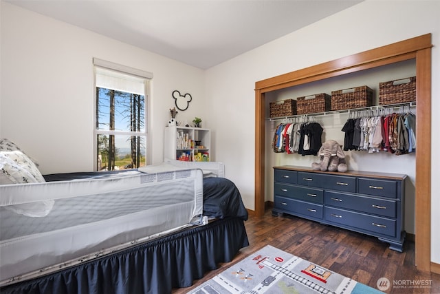 27406 NE 65th St, Camas, WA 98607 - bedroom with dark wood-style floors and a closet