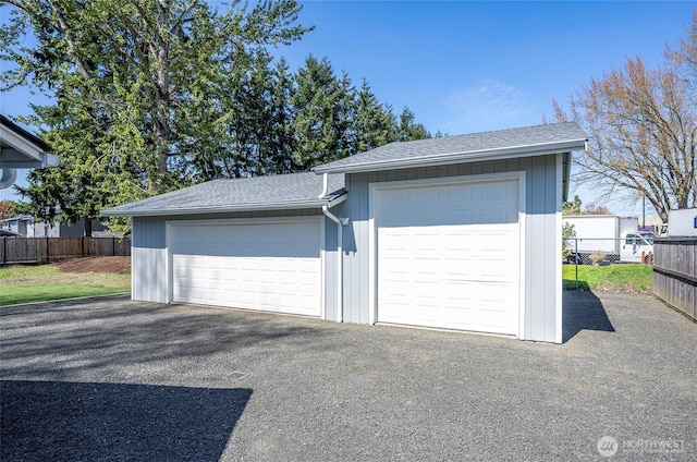 303 Alder Ln N, Pacific, WA 98047 - detached garage featuring fence
