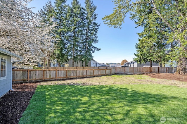 303 Alder Ln N, Pacific, WA 98047 - view of yard with a fenced backyard
