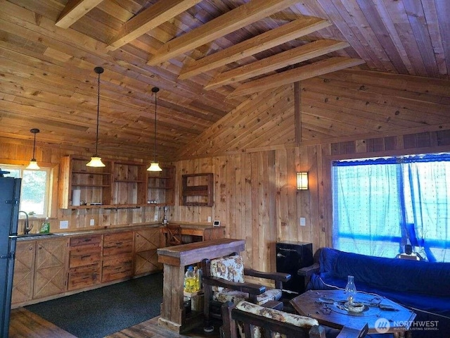 interior space featuring wooden ceiling, wood walls, and vaulted ceiling with beams