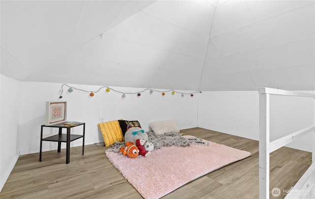 4204 Letitia Ave S, Seattle, WA 98118 - bedroom with lofted ceiling, baseboards, and light wood-type flooring