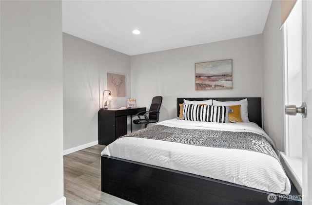 4204 Letitia Ave S, Seattle, WA 98118 - bedroom featuring wood finished floors, baseboards, and recessed lighting