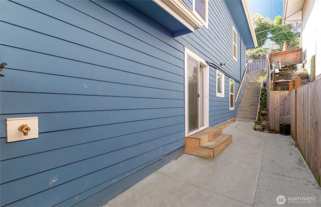 4204 Letitia Ave S, Seattle, WA 98118 - view of side of home with a patio area and fence