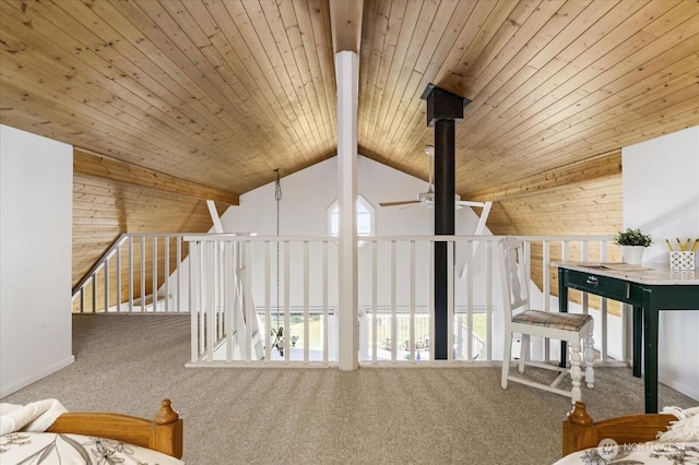 2963 Saratoga Rd, Langley, WA 98260 - additional living space with carpet, a wealth of natural light, wood ceiling, lofted ceiling with beams, and ceiling fan